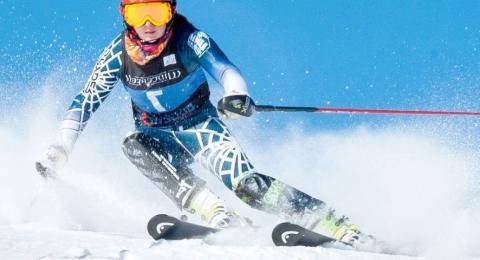 Downhill skiier during race